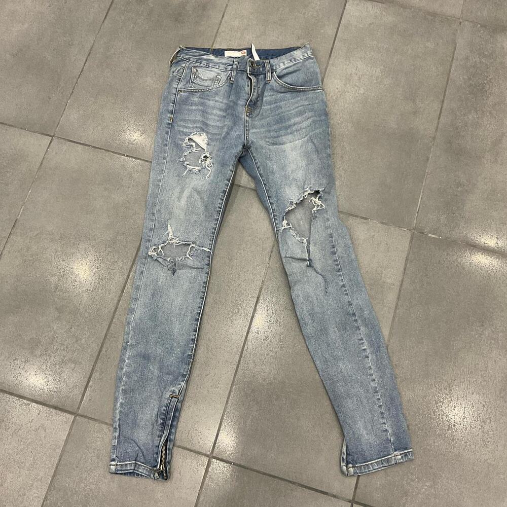 Light blue skinny ripped jeans